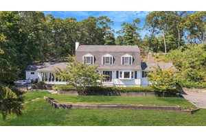 Welcome to this stunning, fully renovated 2022 dutch colonial home set on three quarters of an acre in the heart of Smithtown, with a resort style backyard !