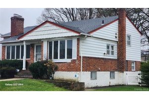 Well maintained 4 bedroom, 3 full bath split level home in the highly sought after Jericho School District !