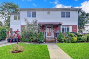 Spacious 5 bedroom colonial with over 2200 sq ft of living space in New Hyde Park Garden City Park school district.