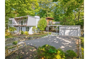 Welcome to your mid century modern oasis with sweeping Hudson River views.