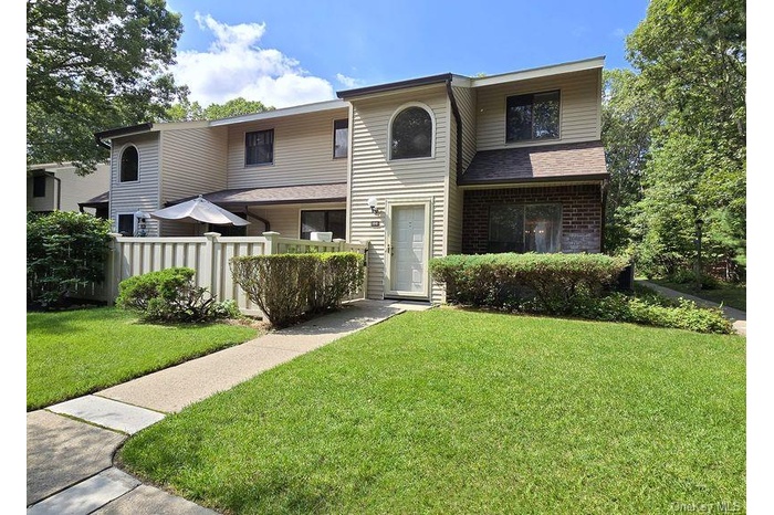View of front of house featuring brick siding