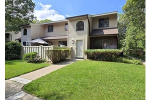 Well maintained Malibu model corner unit located in the desirable Bretton Woods community situated on a 9 hole Golf Course.