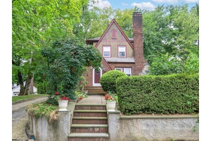 Classic Tudor with Sun Drenched Charm.