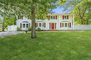 This center hall colonial in the Mount Sinai school district has it all.