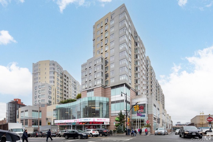 View of building exterior featuring a city view