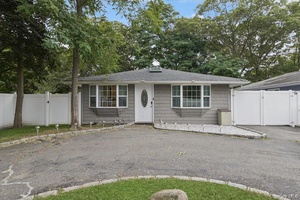 Welcome to 7 Pine Tree Drive, a cozy and stylish 3 bedroom, 2 bathroom ranch tucked away on a quiet dead end street in Shirley.