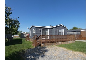 Well maintained 2 bedroom, 1 bathroom summer retreat, ideally situated within the serene Vine Ridge Resort in picturesque Niagara on the Lake.