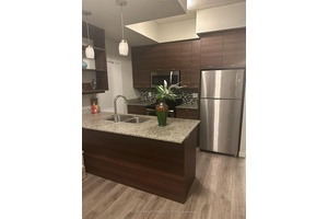 Beautiful 1 Bedroom Den Condo in the Heart of the University District !