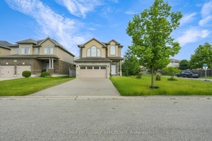 This beautiful split level home sits on a large corner lot in a desirable north London neighborhood, offering the perfect blend of convenience and tranquility.