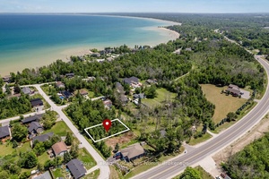 Discover the perfect canvas for your dream home on this great sized lot measuring 65 x 122 ft, nestled steps to the waters of Georgian Bay.