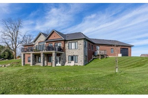 Experience country living at its finest with this breathtaking 51 acres of prime agricultural farmland residence in Amaranth.
