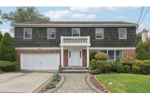 Welcome to this distinguished 4 bedroom, 2 1 2 bath Center Hall Colonial home.