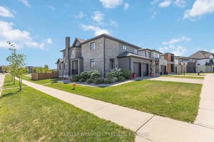 Experience modern, spacious living in this beautifully designed 5 bedroom, 4 bathroom executive home on Heardcreek Trail.