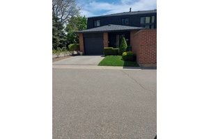 Rarely offered quad highly desirable end unit townhouse with private patio and garden in the sought after enclave of Craigie Orchards.