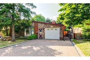 Step Into Your Private Backyard Oasis With This Beautifully Updated 3 Bedroom Detached Home !