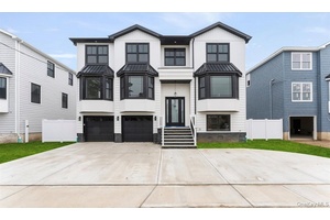 Welcome to 905 Greenfield Rd, a stunning new construction in the prestigious Academy Area of Woodmere.