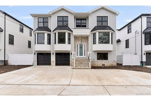 Welcome to 909 Greenfield Rd, a stunning new construction in the prestigious Academy Area of Woodmere.