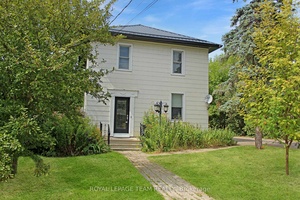 Welcome to one of the largest residential lots in town, sitting on an impressive 0.