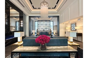 Welcome to this beautifully designed north facing suite offering approximately 1, 065 SF of modern living space in a prestigious building with full amenities.