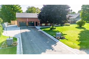 Finished To Perfection ! This Beautiful 4 Bedroom, 3 Bathroom Raised Bungalow Has Been Gorgeously Updated And Sit On A Massive Private Lot, That Is Perfectly Situated On A Quiet ...