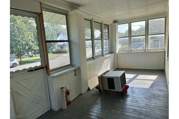 Enclosed front porch