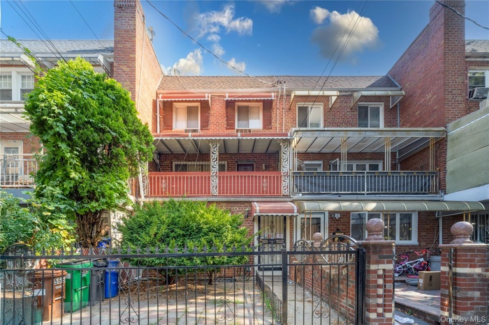View of property with a fenced front yard