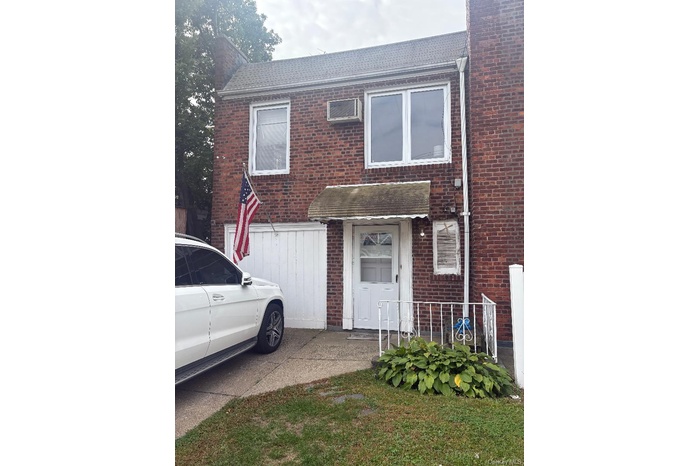 View of front of home with brick siding