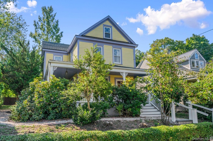 View of front of property with a porch