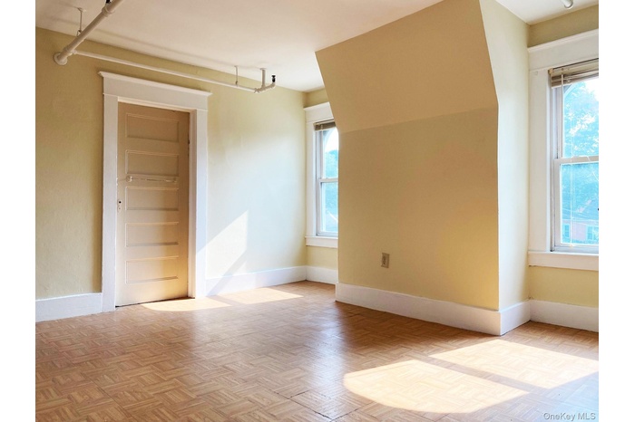 Empty room with healthy amount of natural light