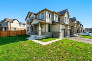 Welcome to 58 Keelson Street in Welland, a bright and modern 2023 end unit townhome that feels more like a detached.