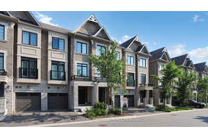 Elegant, Sun Filled Townhome in Prestigious Rouge Woods !