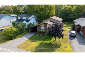 DESIRABLE FAMILY HOME ! DESIRABLE COUNTRY SETTING In Town !