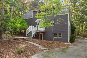 Enjoy a beautifully updated home in the desirable Harbor Lights beach community.