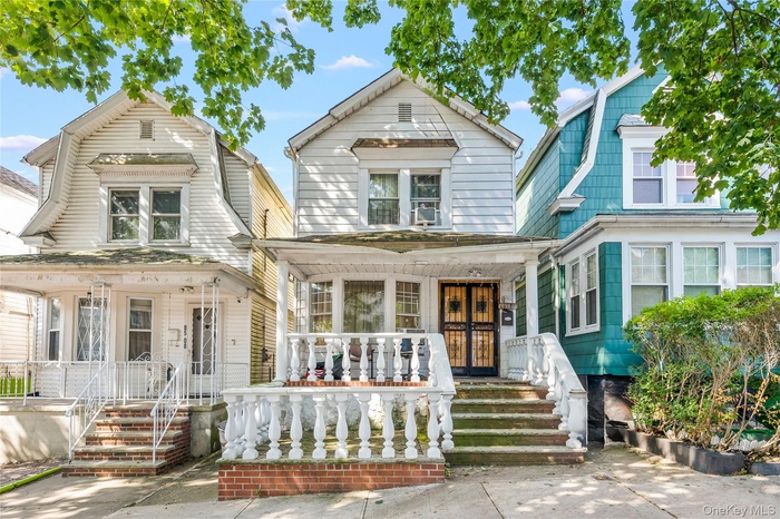 Dutch colonial with covered porch