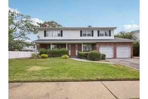 Charming Colonial in Massapequa Spacious Layout with Income Potential !