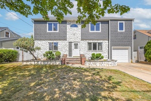 Welcome to 203 N Manhattan Ave an outstanding colonial home located in the heart of Massapequa.