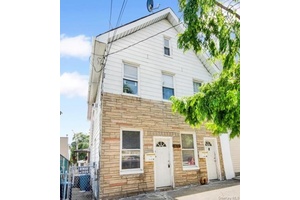 This two family home presents an incredible opportunity for those looking to live in, or an Investor Investment property.