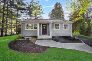Tucked away on 3. 5 acres of park like property possibly sub dividable in Hopewell Junction, this beautifully updated Ranch style is cozy yet spacious main level featuring 3 bedrooms, ...