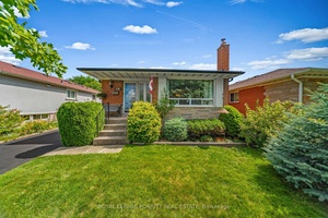 Welcome to this solid brick 3 bedroom bungalow, beautifully styled with Mid Century Modern flair.