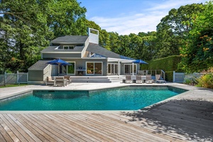 QUOGUE VILLAGE SOUTH. This sun filled contemporary home situated on a private 1 acre was meticulously renovated in 2021.