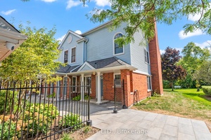 Welcome to this bright and spacious end unit condo townhouse offering convenient one level living !