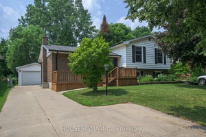 Welcome to this charming four level side split nestled on a quiet, tree lined street in desirable northwest London.