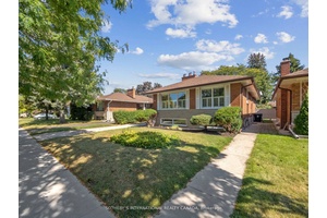 Modern and bright lower level apartment with a private separate entrance, high ceiling heights, ensuite laundry and two spacious bedrooms with closets.
