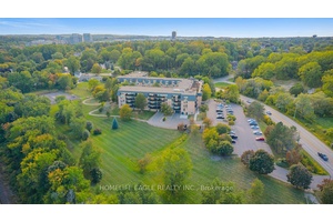 The Perfect 2 Bedroom Backing Onto Unobstructed Conservation Green Scenery !