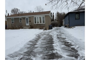 Bright and spacious 3 bedroom, 1 bath main level unit in a well maintained detached bungalow.