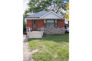Premium Lot Size. Detached 3 bedroom bungalow with side door, partially finished basement, carpet orginal strip hardwool floors underneath on main floor.