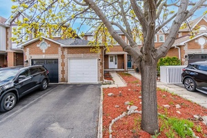 Beautiful Freehold Townhouse Located On A Quite Inside Street, Close To All Amenities Including Schools, Shops And Completely Move In Ready.