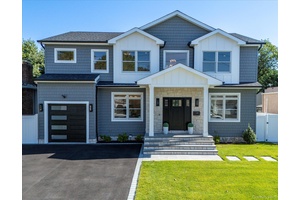 Welcome to this exceptional new construction located in the heart of Merrick !
