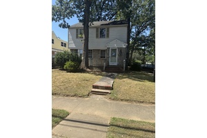 3 BRs 1 Bath Featuring a Spacious Living Room, Formal Dining Room, and Full Basement.