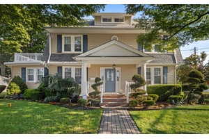 Welcome to this grand Mother Daughter Victorian house that is situated in the heart of Malverne s charming Village.